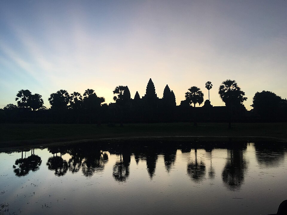 Ancient stone gates of Angkor at dawn